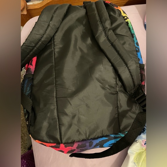 A medium sized colorful backpack. - Picture 3 of 3